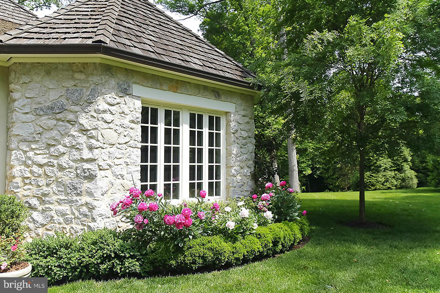 8106 Merrick Road Bethesda, MD 20817 - Photo 25 of 27 a view of a house with a yard
