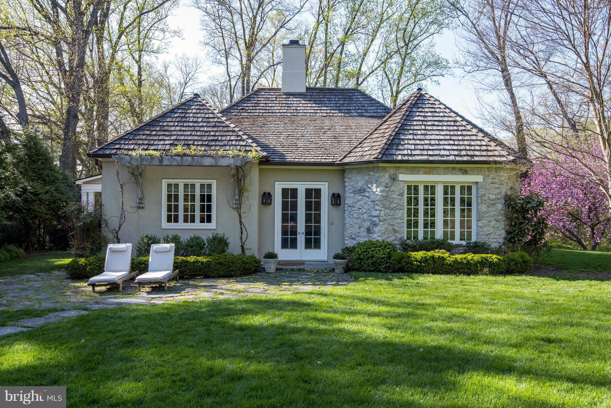 8106 Merrick Road Bethesda, MD 20817 - Photo 26 of 27 a front view of a house with a yard