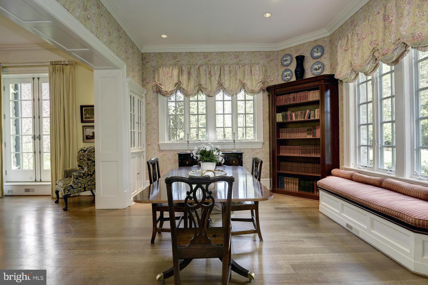 8106 Merrick Road Bethesda, MD 20817 - Photo 7 of 27 a living room with furniture and a large window