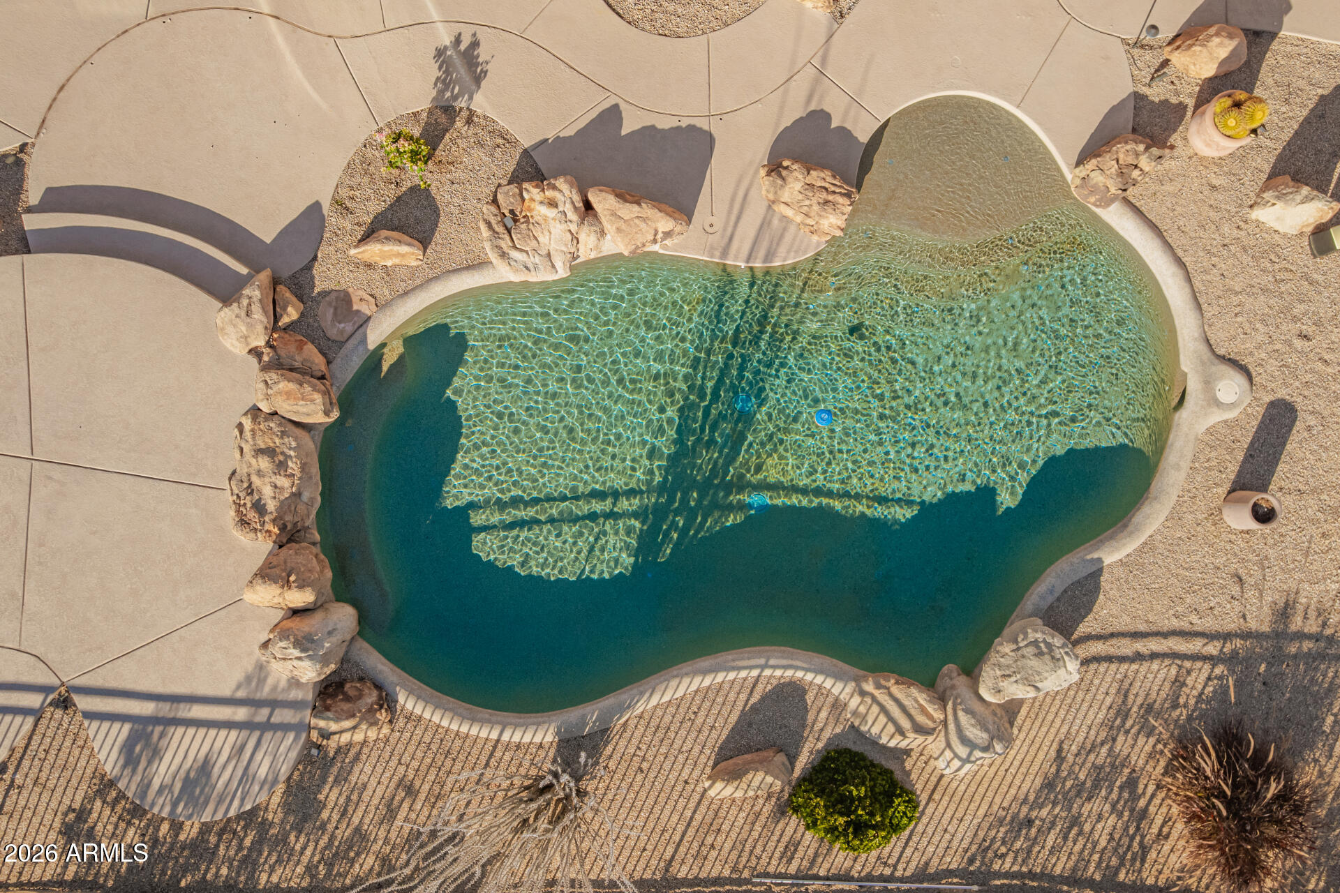 11221 East Greenway Road Scottsdale, AZ 85255 - Photo 34 of 47 Sparkling Pool with Baja Shelf