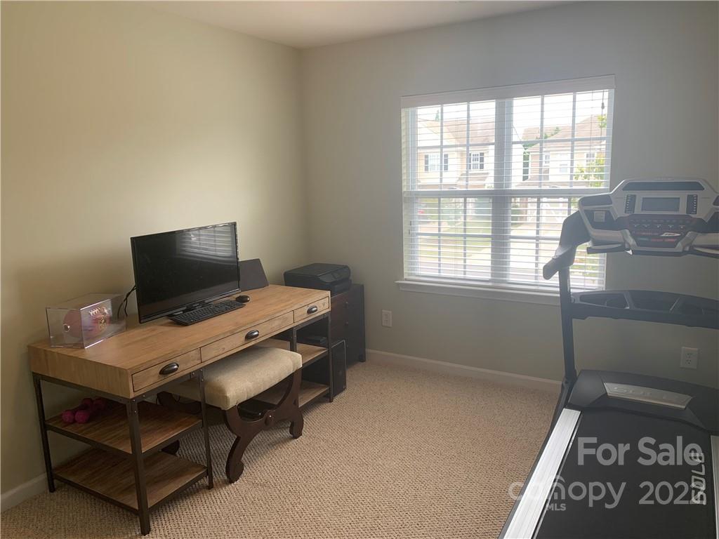 6518 Del Rio Road Charlotte, NC 28277 - Photo 13 of 19 a bedroom with a bed and a window