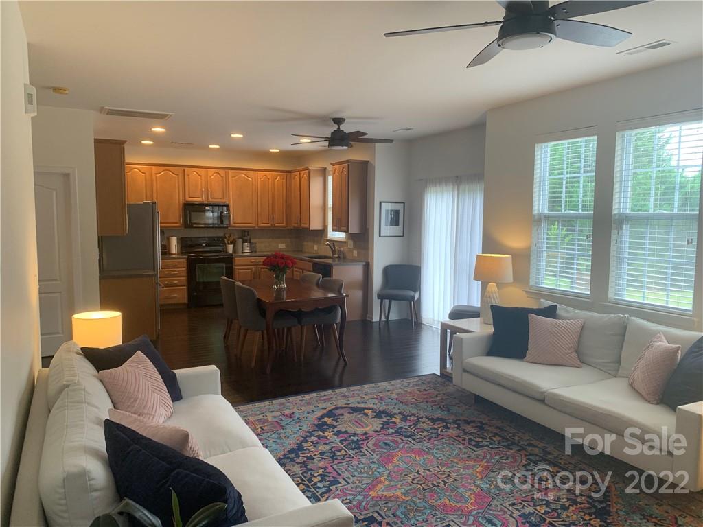 6518 Del Rio Road Charlotte, NC 28277 - Photo 6 of 19 a living room with furniture and a fireplace