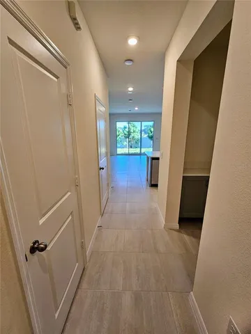 a view of entryway with a window and stairs