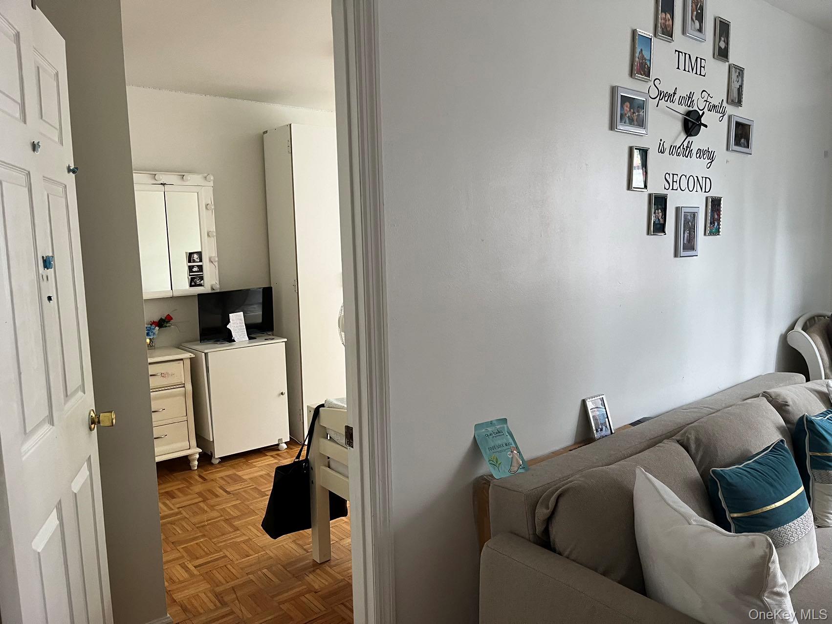 109-12 Westside Avenue Queens, NY 11368 - Photo 14 of 16 a living room with furniture