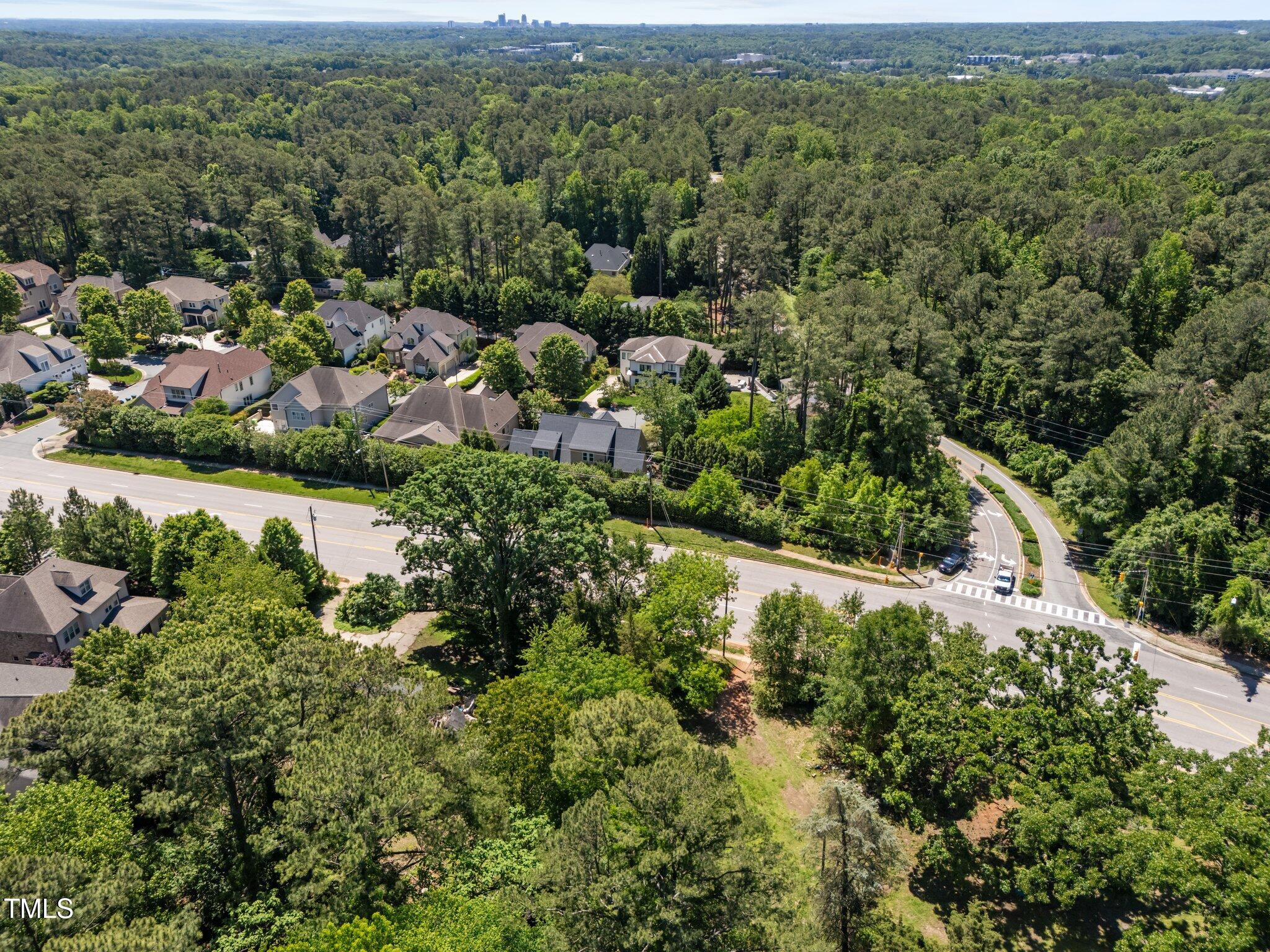 1910 West Millbrook Road Raleigh, NC 27612 - Photo 3 of 8 an aerial view of street and residential houses