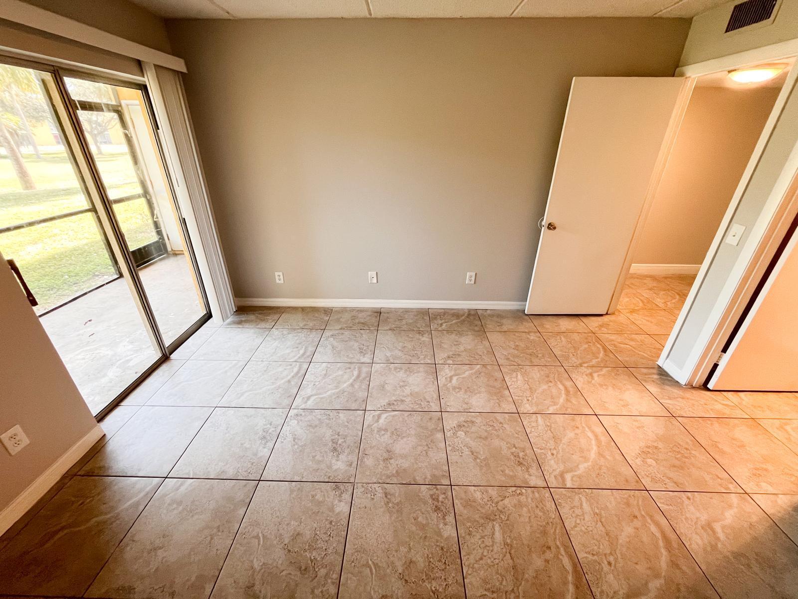1106 Meadows Circle Boynton Beach, FL 33436 - Photo 14 of 16 a view of an empty room with a window