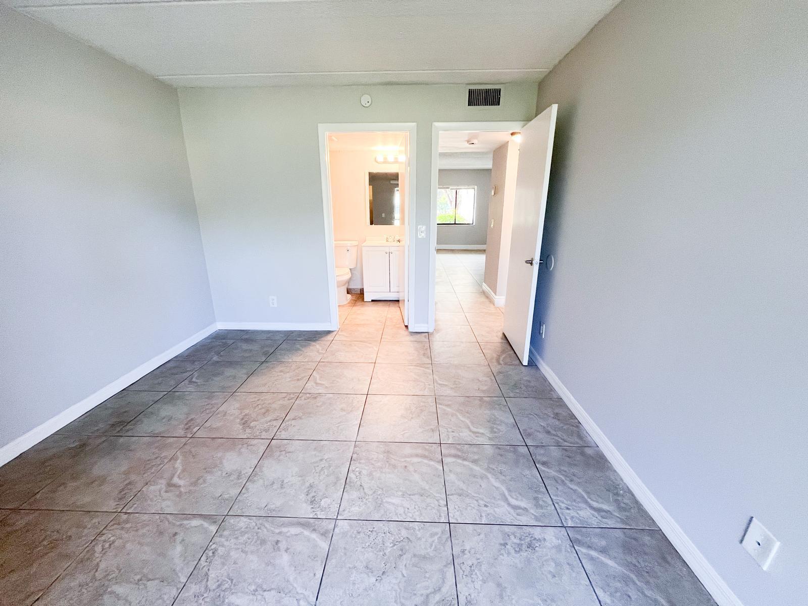 1106 Meadows Circle Boynton Beach, FL 33436 - Photo 7 of 16 a view of a hallway