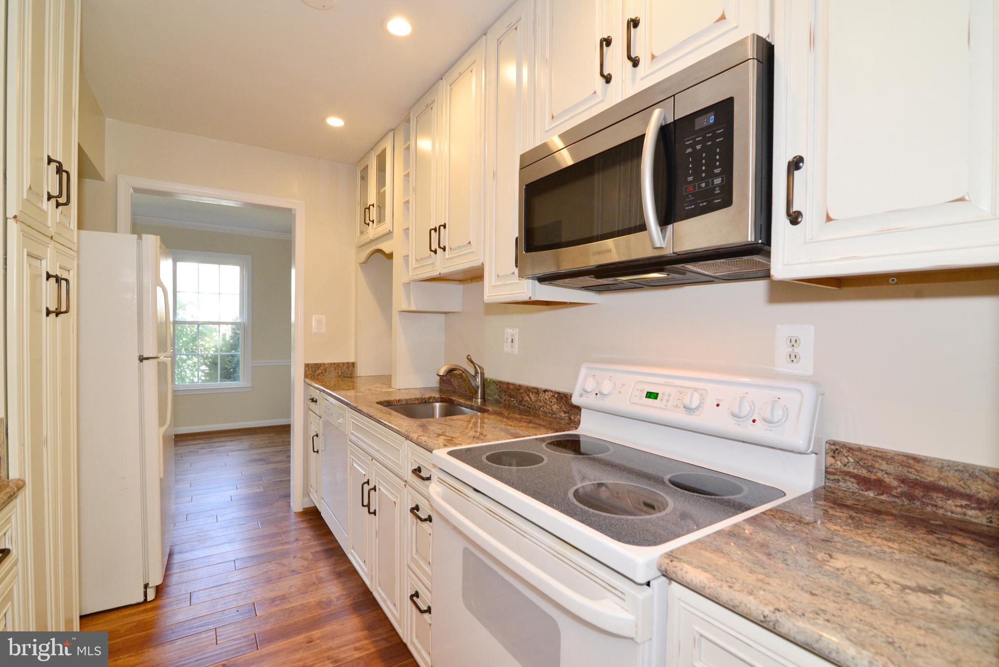 Upgraded granite counters and backsplash.