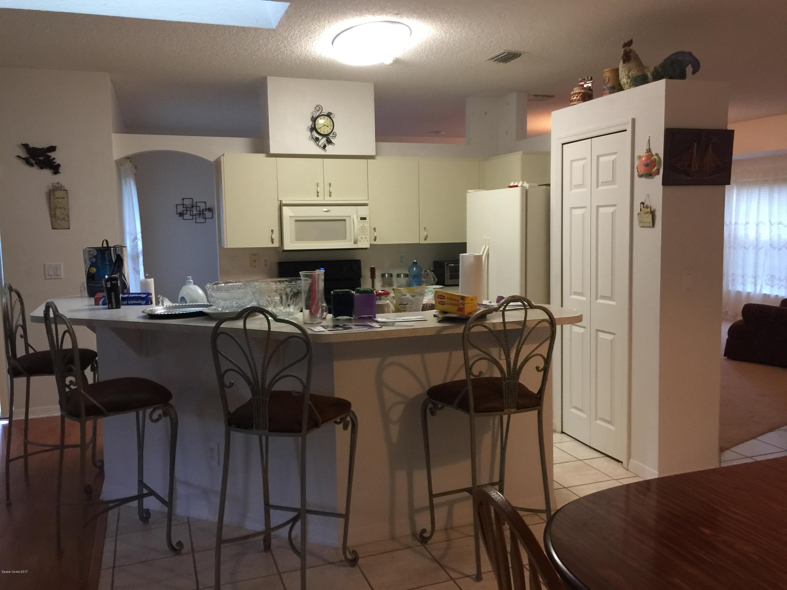 821 Raleigh Road Southeast Palm Bay, FL 32909 - Photo 2 of 11 kitchen