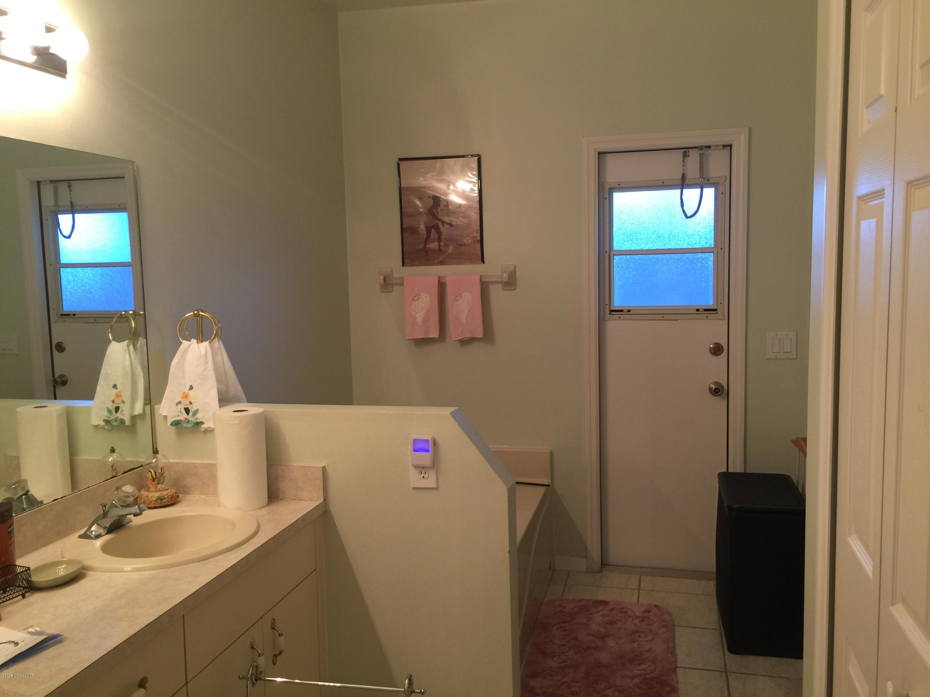 821 Raleigh Road Southeast Palm Bay, FL 32909 - Photo 11 of 11 master bathroom