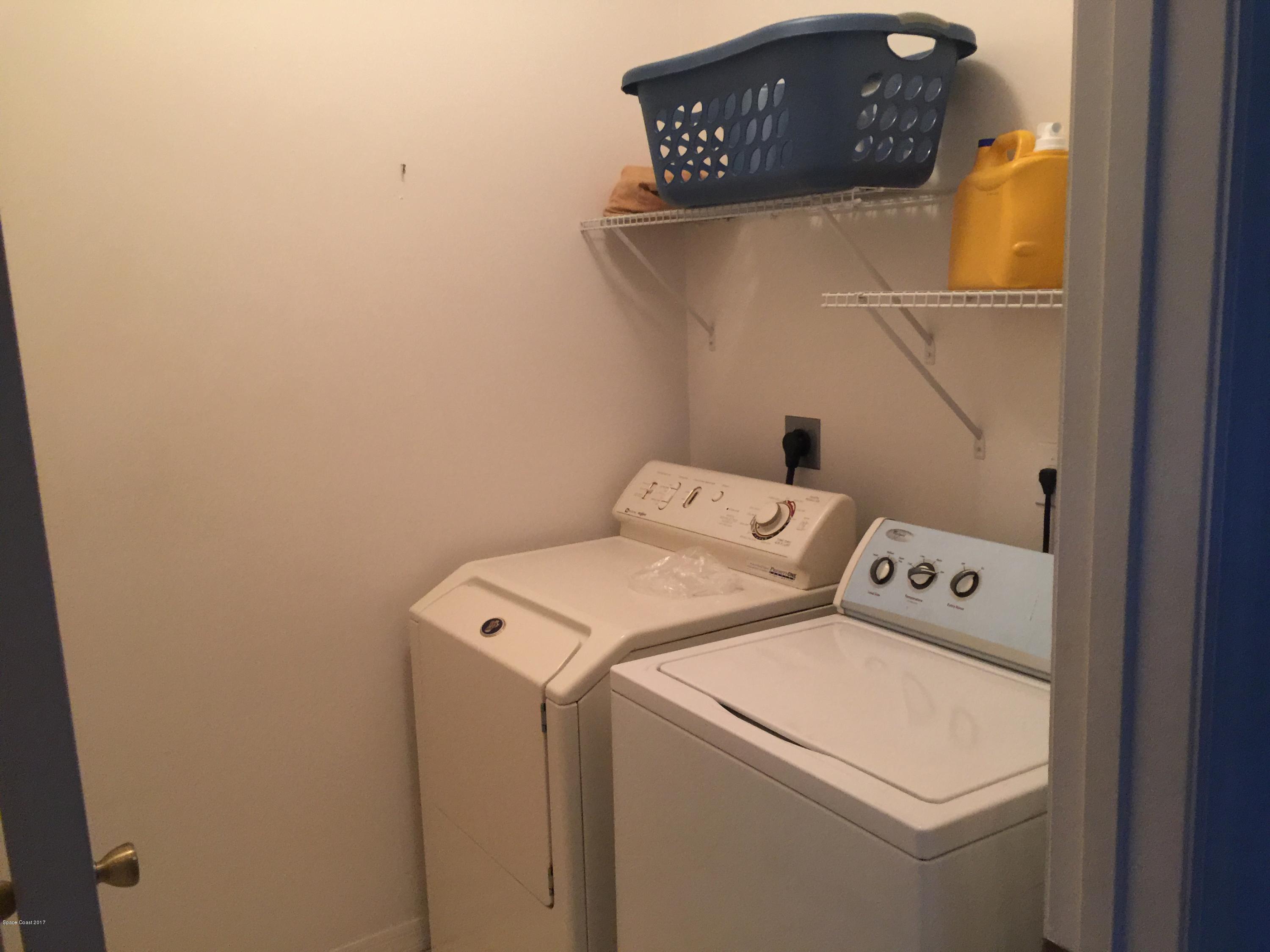 821 Raleigh Road Southeast Palm Bay, FL 32909 - Photo 4 of 11 Laundry