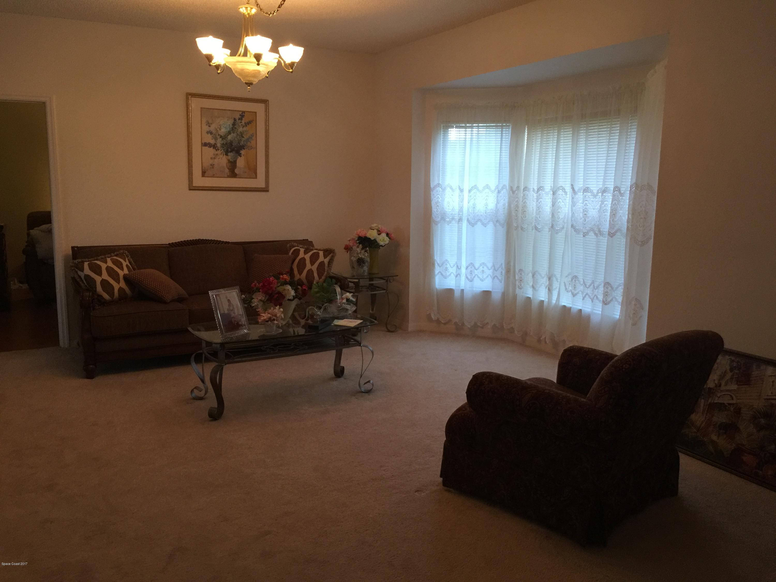 821 Raleigh Road Southeast Palm Bay, FL 32909 - Photo 5 of 11 Living room