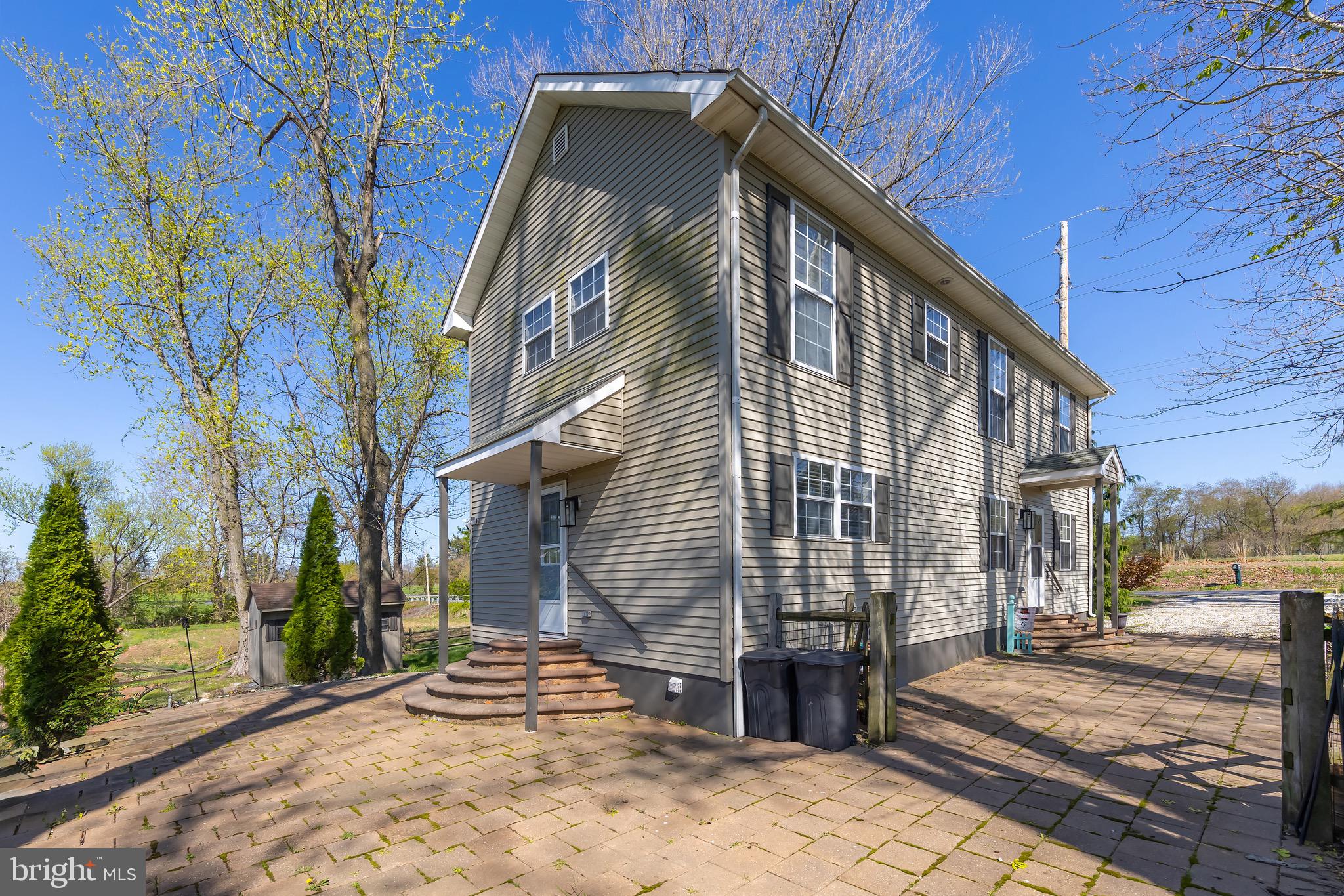 578 Eldridges Hill Road Pilesgrove, NJ 08098 - Photo 16 of 20 a view of the house with a yard