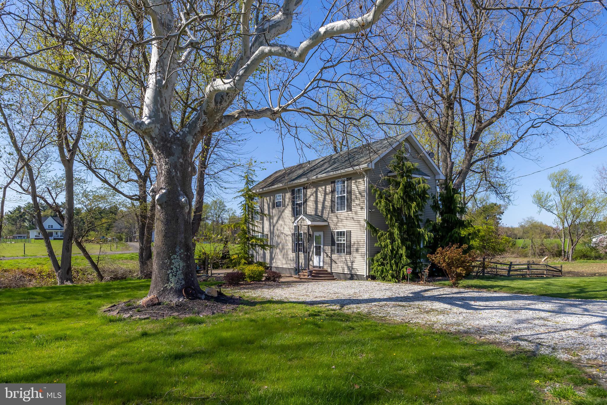 578 Eldridges Hill Road Pilesgrove, NJ 08098 - Photo 3 of 20 a view of a house with a yard