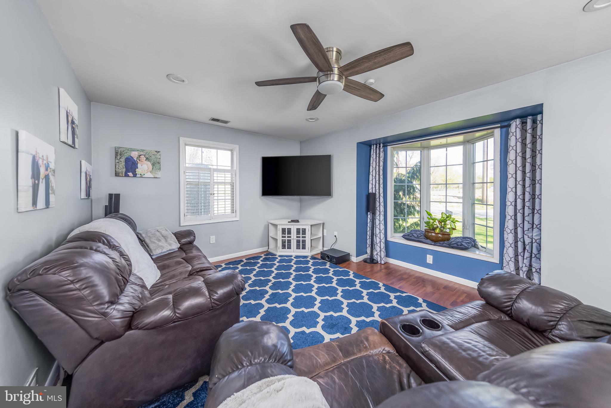 578 Eldridges Hill Road Pilesgrove, NJ 08098 - Photo 4 of 20 a living room with furniture ceiling window and a flat screen tv
