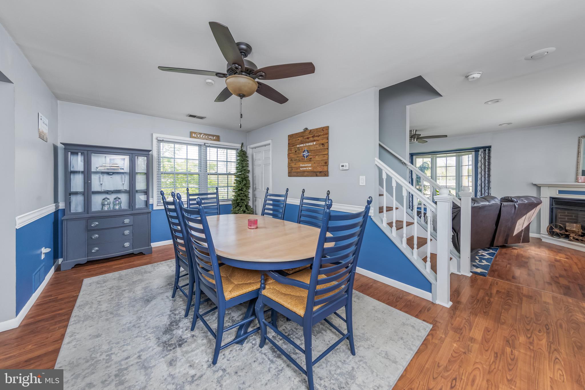 578 Eldridges Hill Road Pilesgrove, NJ 08098 - Photo 6 of 20 a dining room with furniture a rug and wooden floor