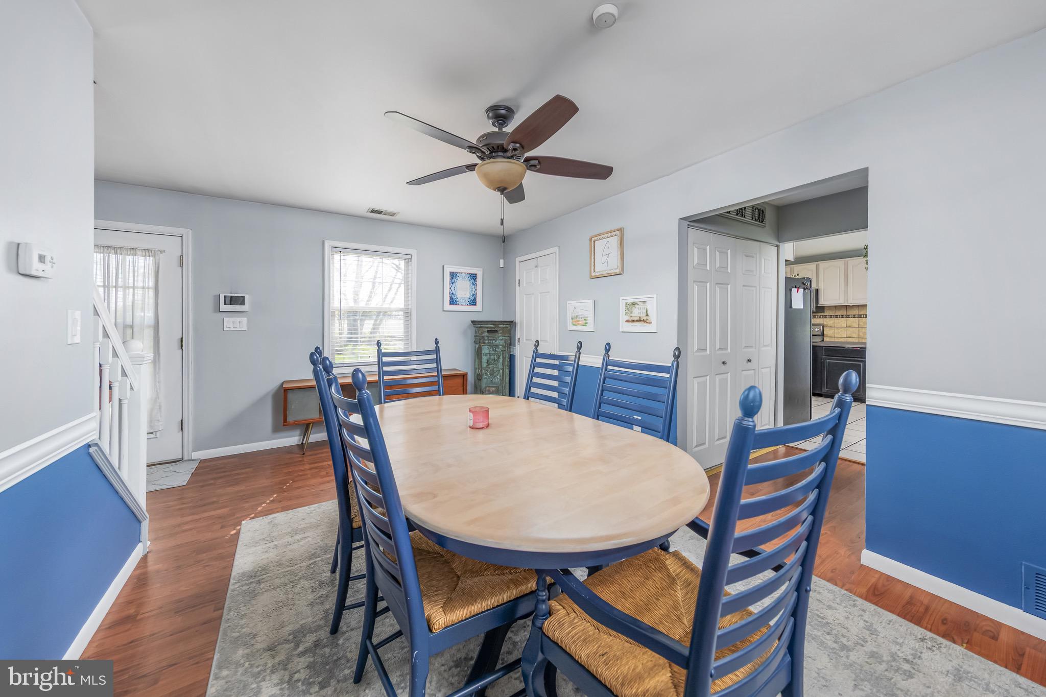 578 Eldridges Hill Road Pilesgrove, NJ 08098 - Photo 7 of 20 a view of a dining room with furniture and wooden floor