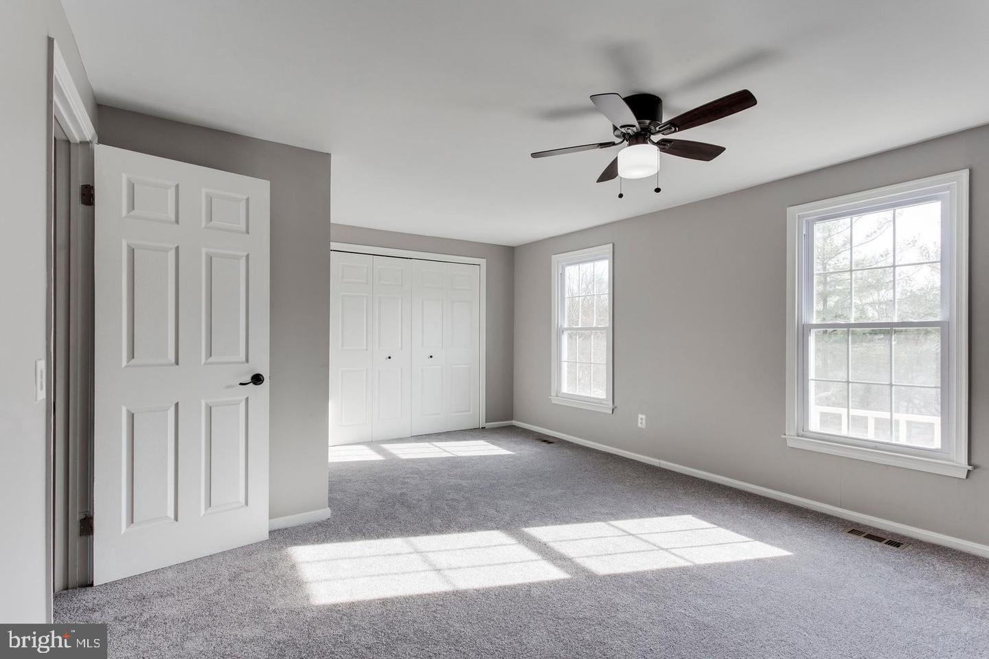 304 Crescendo Way Silver Spring, MD 20901 - Photo 14 of 29 a view of an empty room with a window