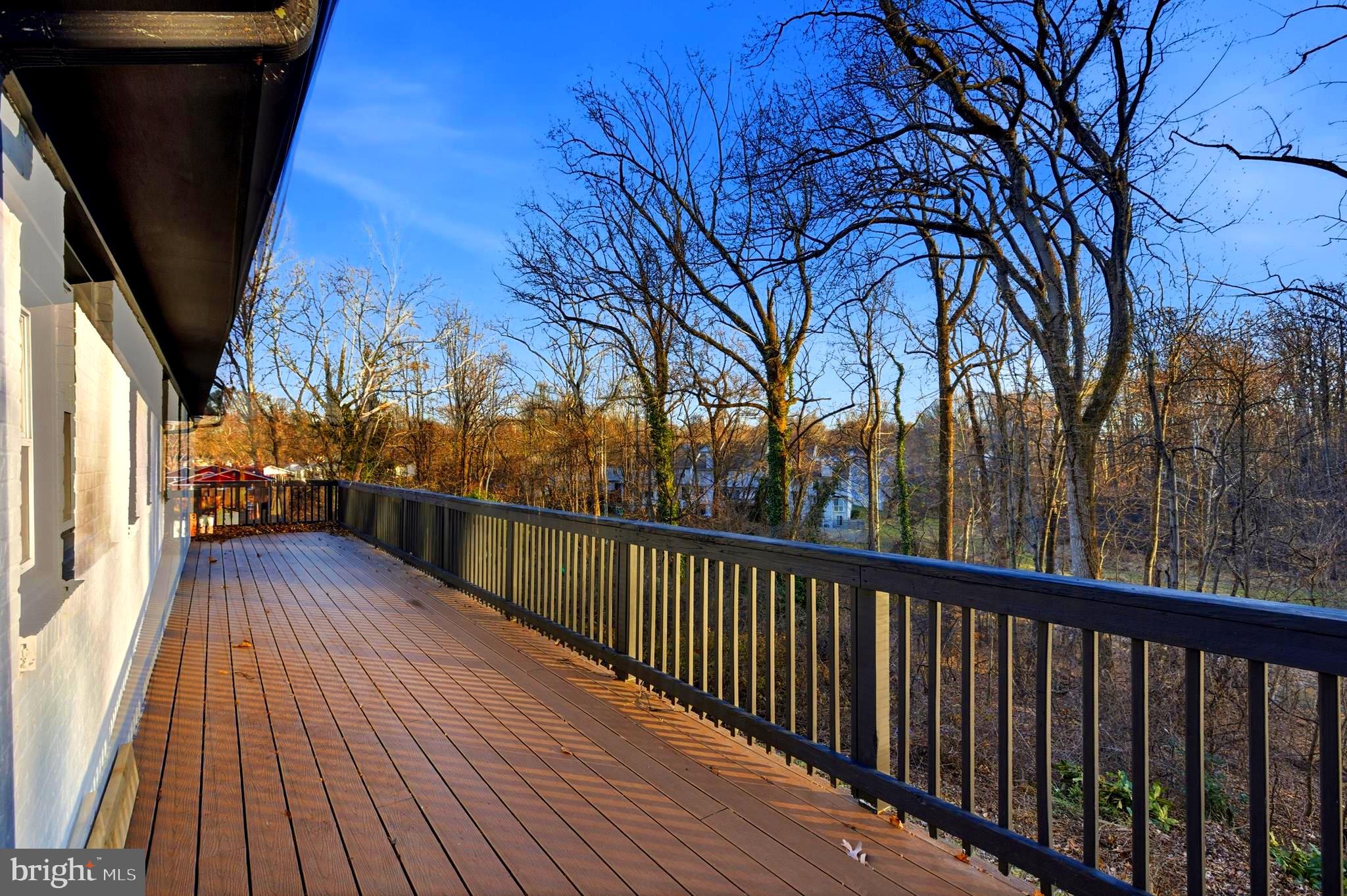 709 Quarry Avenue Capitol Heights, MD 20743 - Photo 25 of 43 a view of balcony with wooden floor and fence