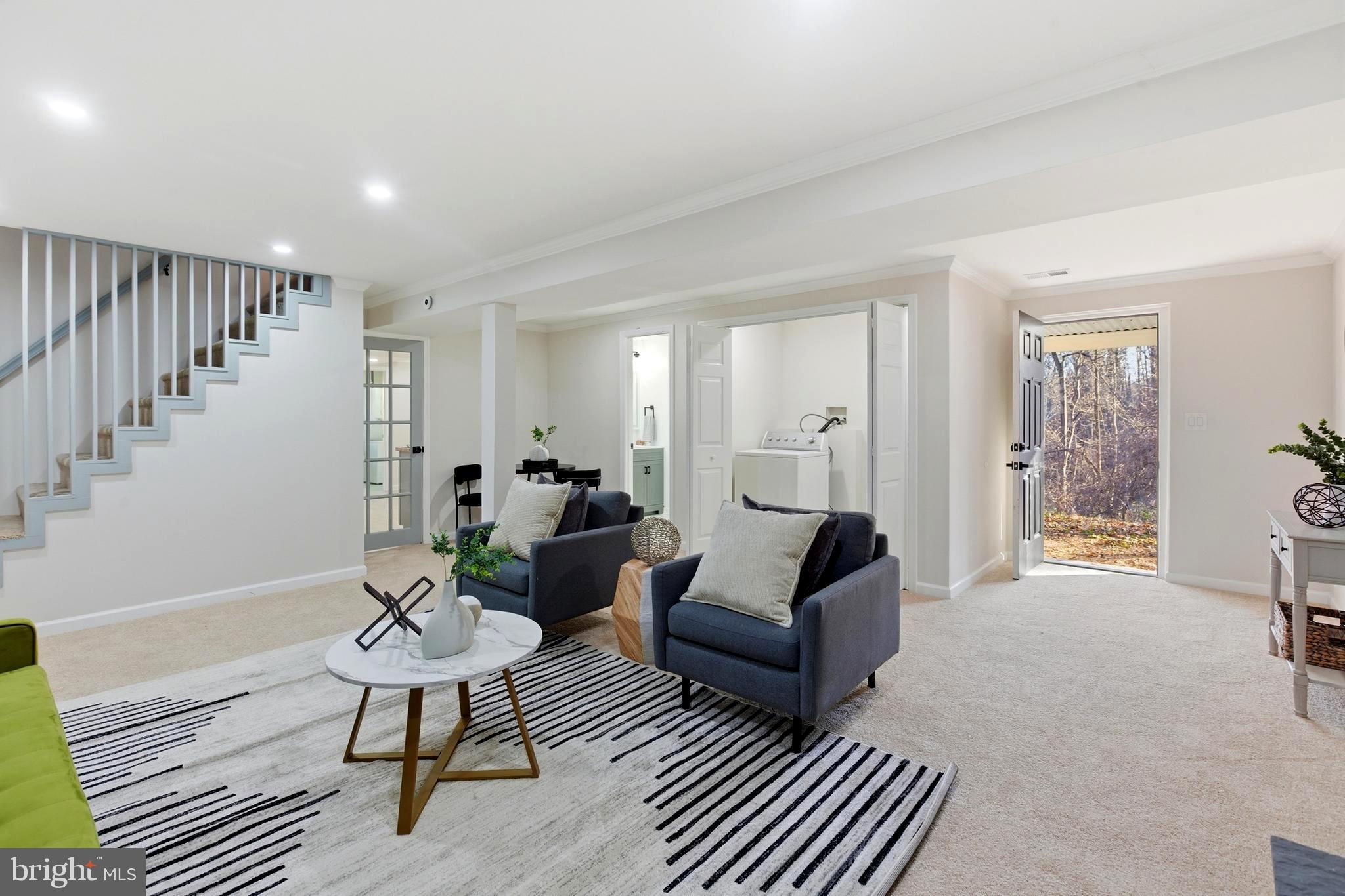 709 Quarry Avenue Capitol Heights, MD 20743 - Photo 28 of 43 a living room with furniture and a table