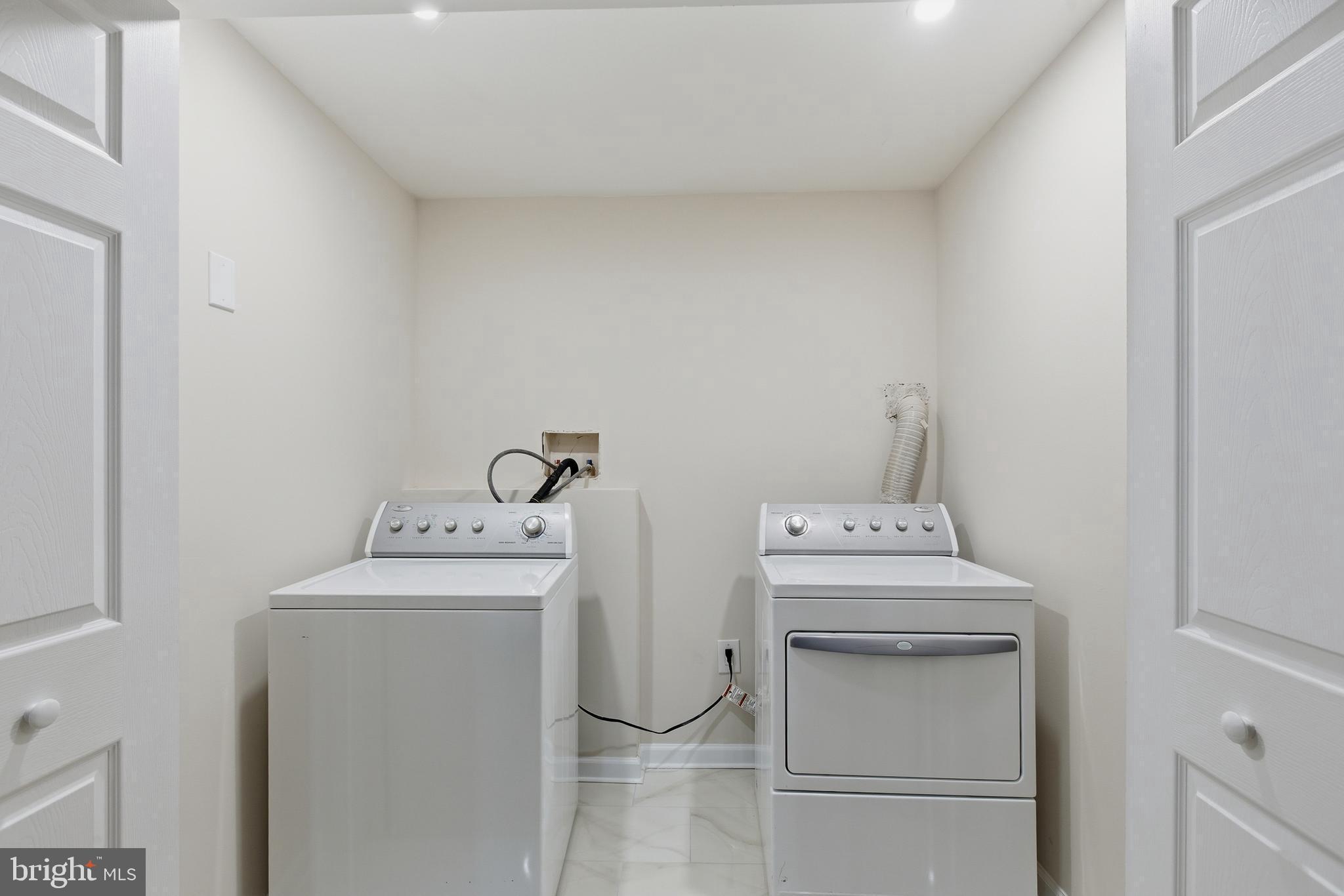 709 Quarry Avenue Capitol Heights, MD 20743 - Photo 29 of 43 a utility room with dryer and washer