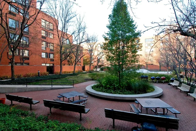 a view of a backyard with sitting area