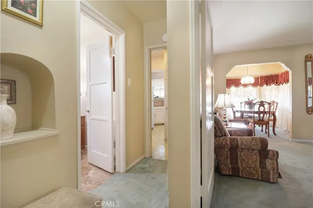 a view of a livingroom with furniture and windows