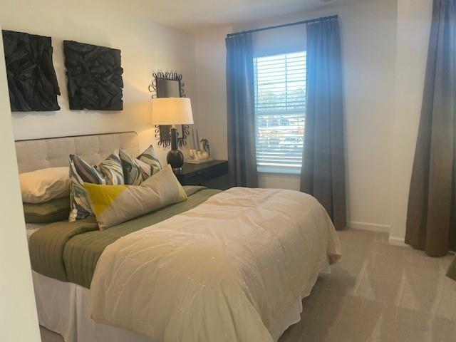 155 Star Court Pendergrass, GA 30567 - Photo 9 of 22 a bedroom with a bed and a window