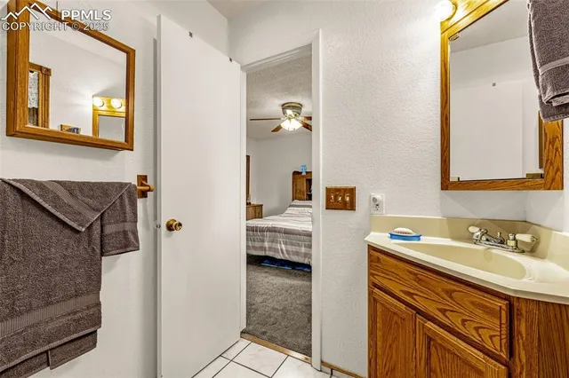 a bathroom with a sink double vanity and a mirror