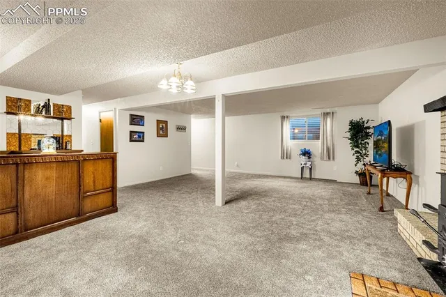 a view of livingroom with furniture and window