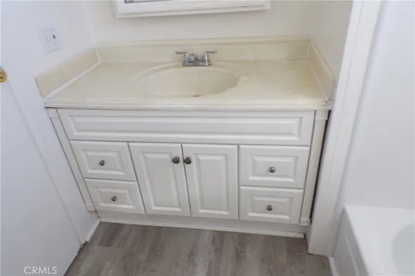 a bathroom with a sink and toilet