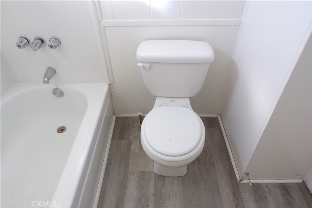 12710 3rd Street, Unit 91 Yucaipa, CA 92399 - Photo 17 of 21 a bathroom with a sink and toilet