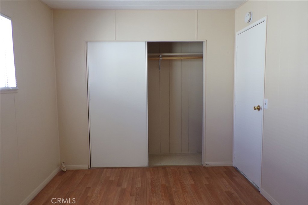 12710 3rd Street, Unit 91 Yucaipa, CA 92399 - Photo 18 of 21 an empty room with closet