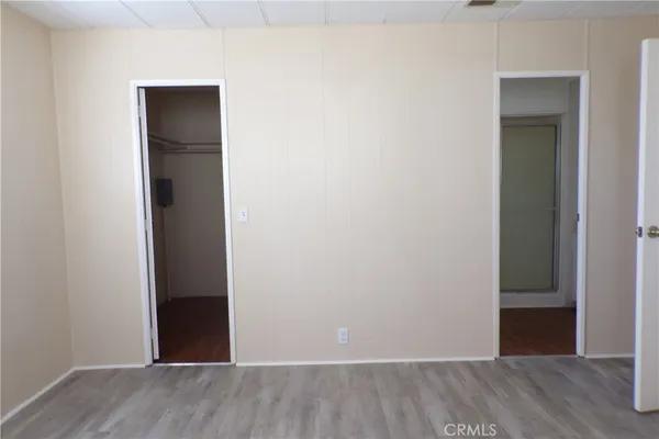 a empty closet with a shower