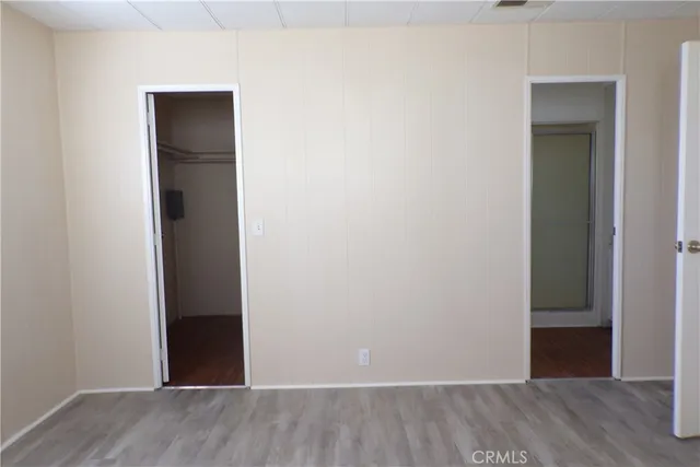 a empty closet with a shower