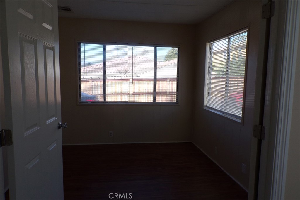 12710 3rd Street, Unit 91 Yucaipa, CA 92399 - Photo 5 of 21 a view of an empty room with a window