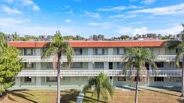 a front view of building with street view