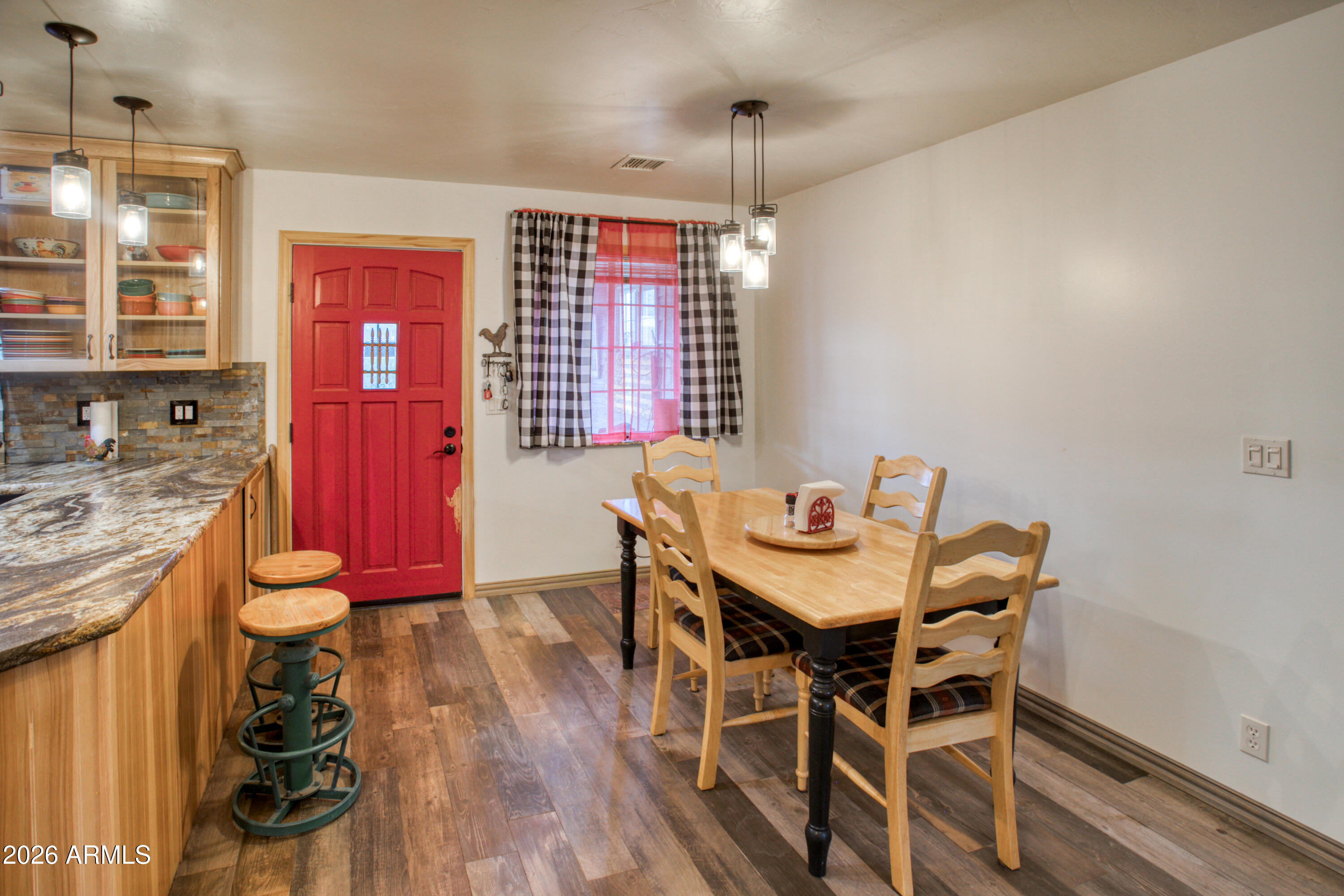5 Co Road Show Low, AZ 85901 - Photo 8 of 39 a view of a dining room with furniture window and wooden floor