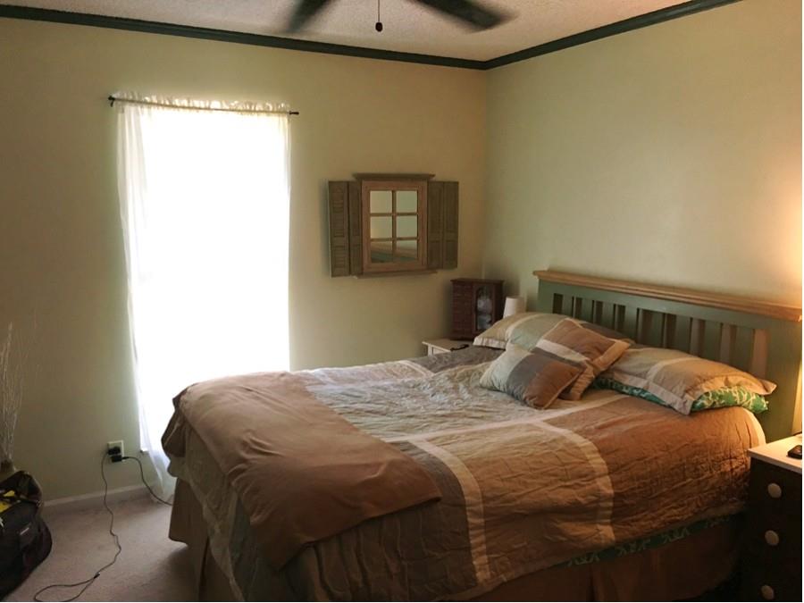 1008 Jacksons Valley Road Hermitage, TN 37076 - Photo 13 of 22 a bedroom with a bed and a window