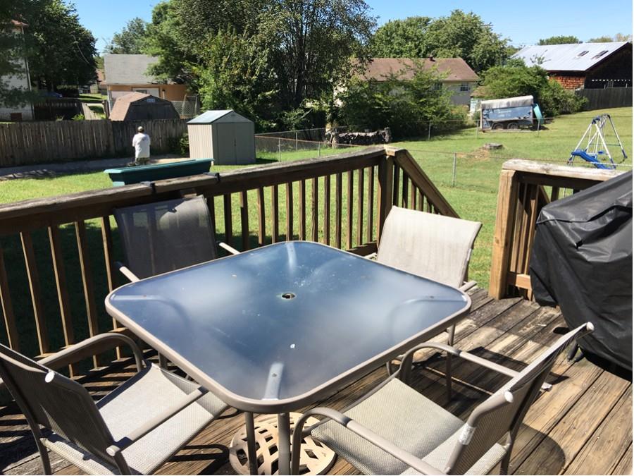 1008 Jacksons Valley Road Hermitage, TN 37076 - Photo 20 of 22 a view of a balcony with two chairs and a stove