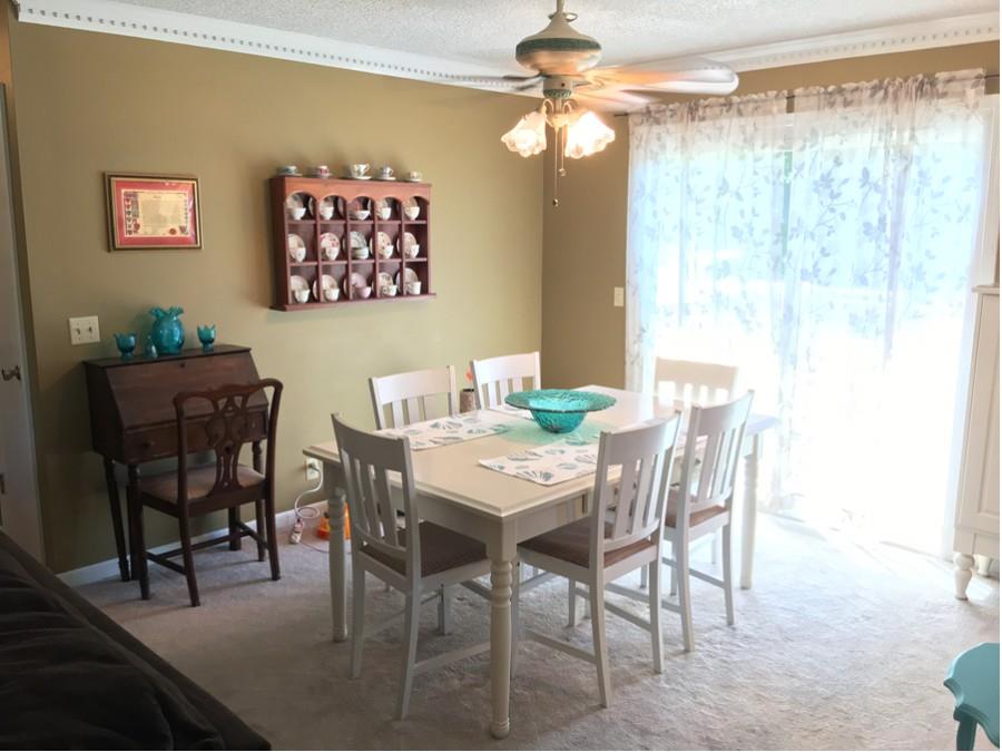 1008 Jacksons Valley Road Hermitage, TN 37076 - Photo 5 of 22 a view of a dining room with furniture window and outside view