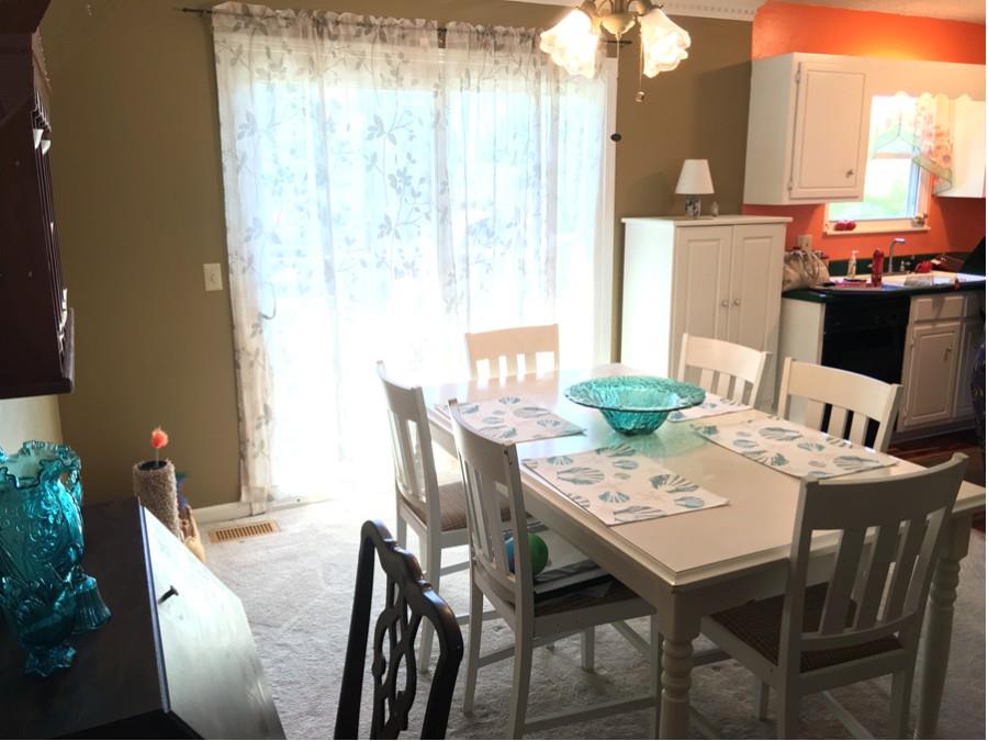 1008 Jacksons Valley Road Hermitage, TN 37076 - Photo 6 of 22 a view of a dining room with furniture and wooden floor