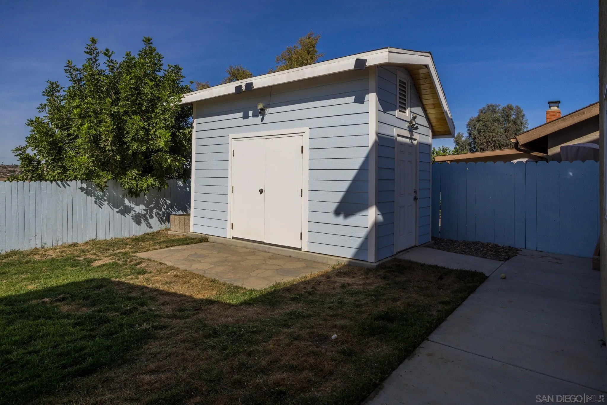 532 Kempton Street Spring Valley, CA 91977 - Photo 29 of 30 a view of a house with a yard