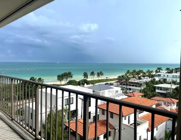 a view of a swimming pool with a lounge chair
