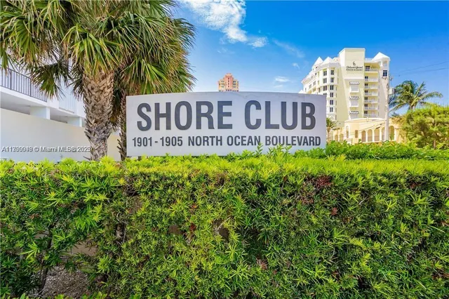 a sign on the side of the road