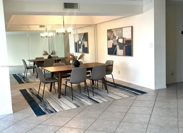 a kitchen with stainless steel appliances a sink and a counter top space