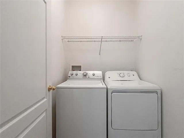 a view of a livingroom with furniture