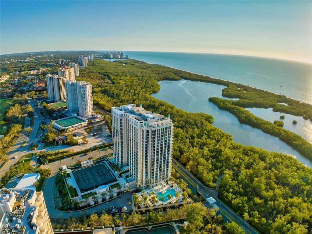 6897 Grenadier Boulevard, Unit 1804 Naples, FL 34108 - Photo 1 of 30 a view of a city and ocean view