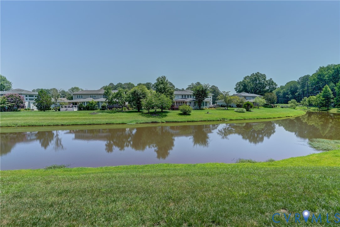 7902 Johnson Road Petersburg, VA 23805 - Photo 55 of 55 Expansive water feature bordered by manicured gree