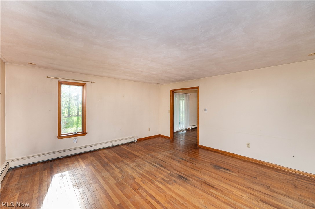 12310 Huntoon Road Painesville, OH 44077 - Photo 3 of 48 Spacious, open living room with hardwood floors